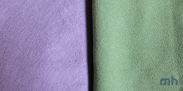 The PackTowl in plum and the REI in green.